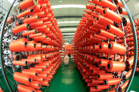 Packaging bag production workshop, The production workshop of woven belt, A factory workshop where textile belts are producedの写真素材
