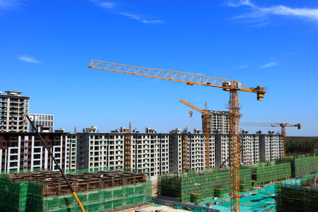 The construction site is under the blue sky, Construction site, the building is under constructionの写真素材