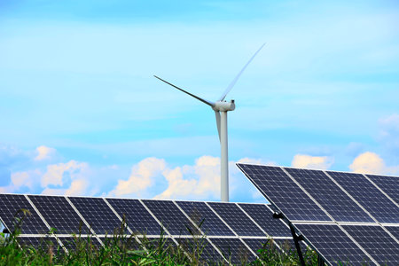 Solar photovoltaic panels and wind turbines. Energy conceptの写真素材