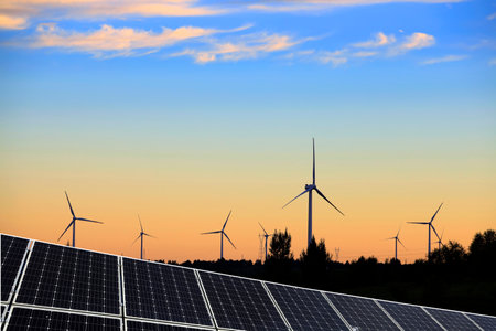 Solar photovoltaic panels and wind turbines. Energy conceptの写真素材