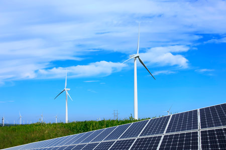 Solar photovoltaic panels and wind turbines. Energy conceptの写真素材