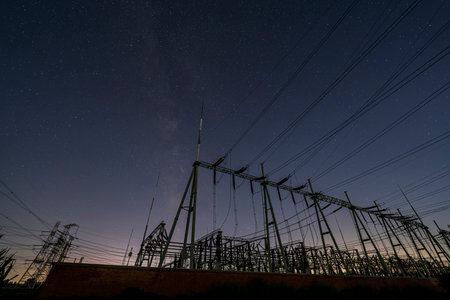 Pylon and star, pylon and the Milky Way, The high voltage substation is under the starsの写真素材