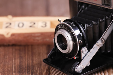 Antique film folding camera and old film, close-upsの写真素材