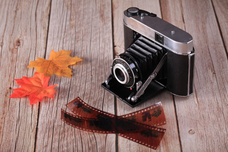 Antique film folding camera and old film, close-upsの写真素材