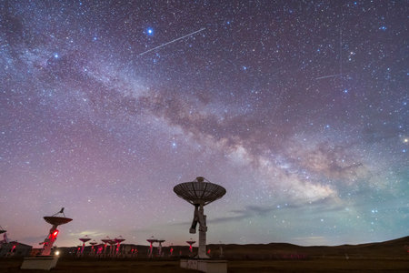 In observatories, satellite antenna radio telescope on the background of stellar tracks, radio telescope on the background of stellar tracks, The observatory's radio telescopeの写真素材