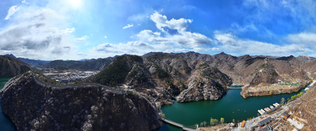 The Great Wall is in China. The Great Wall in spring, the mountains are full of flowers, the Great Wall and the lakeの写真素材