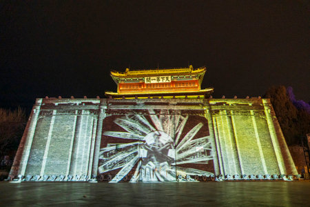 Shanhaiguan Great Wall at night, the great wall of shanhaiguan pass in china, The word in the photo translates as "Shanhaiguan"の写真素材