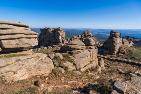 The strange rocks on the mountain are under the blue sky, All kinds of stones on the mountainの写真素材