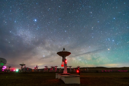 In observatories, satellite antenna radio telescope on the background of stellar tracks, radio telescope on the background of stellar tracks, The observatory's radio telescopeの写真素材