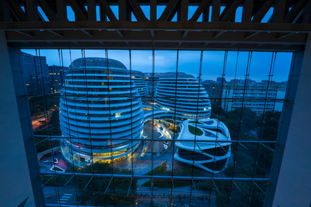 Galaxy Soho Building at night in Beijing, China. Beijing city architecture at night