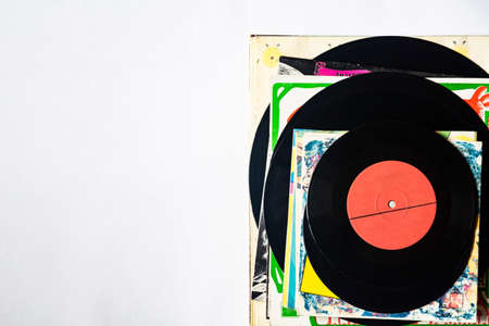 Vinyl records of different diameters on a white backgroundの写真素材