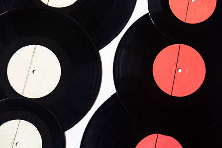 Vinyl records of different diameters on a white backgroundの写真素材