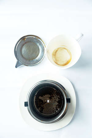 Vietnamese way of brewing coffee. Fin press for brewing coffee. Vietnamese coffee.の写真素材