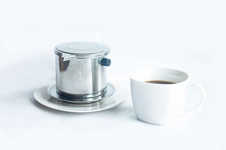 Vietnamese way of brewing coffee. Fin press for brewing coffee. Vietnamese coffee.の写真素材