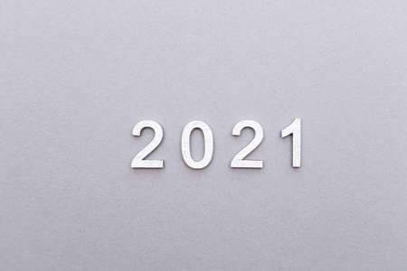 2021 silver numbers festive composition on a gray background with copy space. New year and Christmas conceptの写真素材