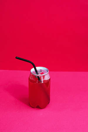 Minimalist bright concept of refreshing summer drink. Jar of cold craft lemonade with a reusable iron straw. Fresh juicy cocktail.の写真素材