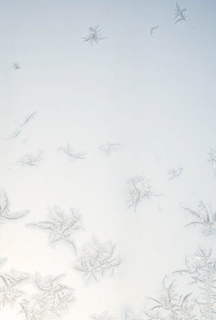 Abstract frost pattern. Frozen noisy window on the cold winter. Texture of ice on window.の写真素材
