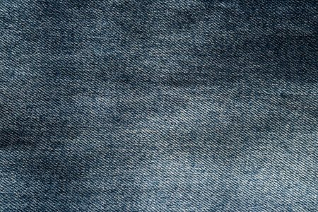 Blue denim macro texture. Jeans background. Abstract western backdrop.