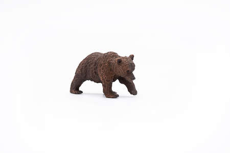 Toy animal figure brown bear on white.の写真素材