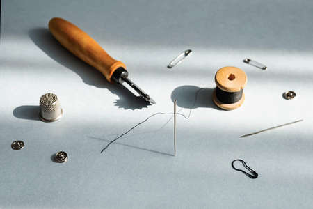 Stitching Tools. Various Tailoring Instruments. Needlework hobby concept.の写真素材