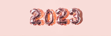 2023 numbers made from foil pink balloons. New year concept.