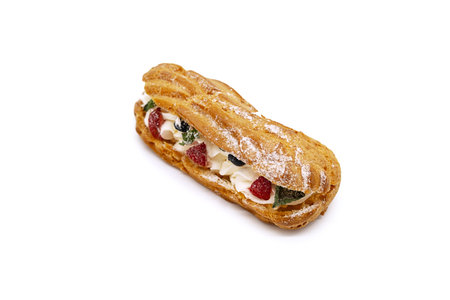 Traditional french dessert opened eclair with buttercream, fresh strawberries, icing sugar and mint...