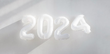 New Year 2024. Monochrome festive background with foil balloon numbers.の写真素材