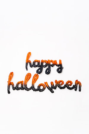 Balloon letters Happy Halloween against white background.の写真素材