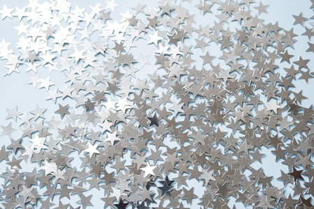 Stars shaped confetti as festive background.の写真素材