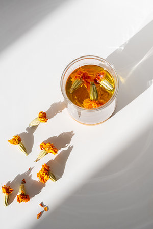 Glass of Wholesome Marigold Herbal Tea.の写真素材