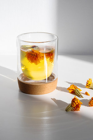 Glass of Wholesome Marigold Herbal Tea.の写真素材