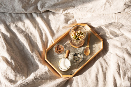 Wholesome Breakfast on Bed in Sunlight.
