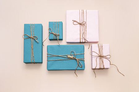Gift Boxes Wrapped with Twine Ribbon. Celebration and Surprise Concept for Holiday Event.の写真素材