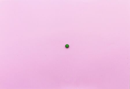 laying on a pink background. Female strip with blood elements. Womens critical daysの写真素材