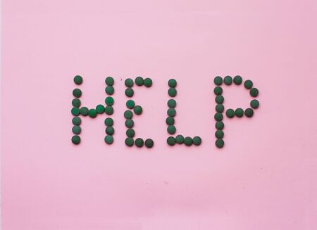 laying on a pink background. Female strip with blood elements. Womens critical daysの写真素材