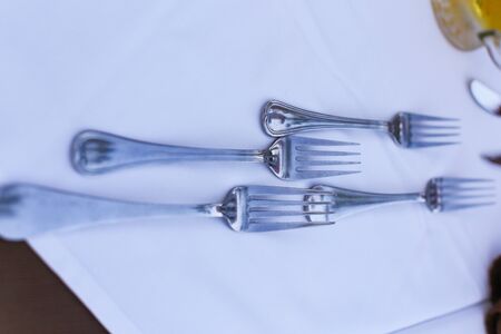 Table set with gold cutlery knife with fork. Dinning concept background. copy spaceの写真素材