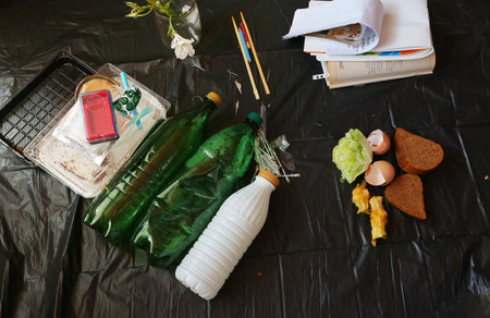 Large heap of garbage inside a processing plant. black backgroundの写真素材