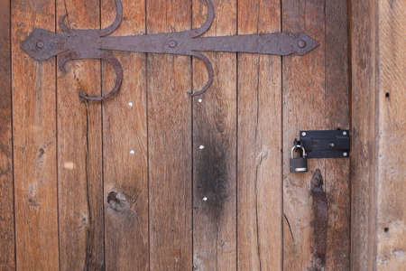 Background of horizontal hewed smooth painted wooden logs close up horizontal view. vintageの写真素材