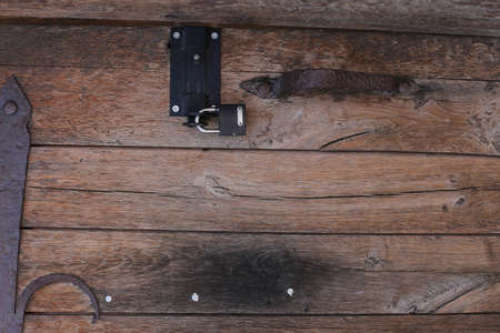Background of horizontal hewed smooth painted wooden logs close up horizontal view. vintageの写真素材