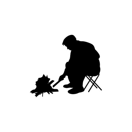 Vector illustration of a silhouette of a man sitting by the fire. Isolated on white background. Man ignites bonfire.のイラスト素材