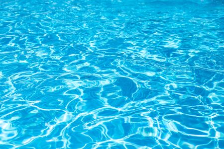 swimming pool with ripple turquoise water backgroundの写真素材