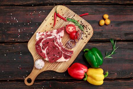 red fresh raw beef veal fillet on cutting plateの写真素材