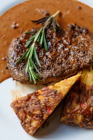 steak on a plate with spicesの写真素材