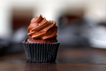 Chocolate capcake with chocolate cream. American dessert. Popular pastries. Cakeの写真素材
