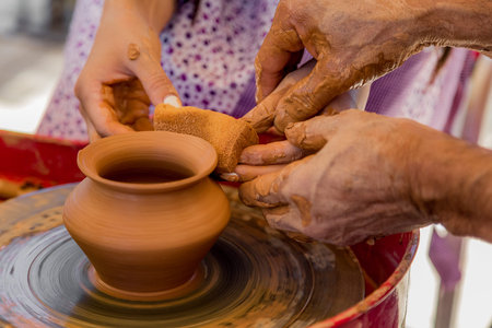 pottery art creation of pot of clay