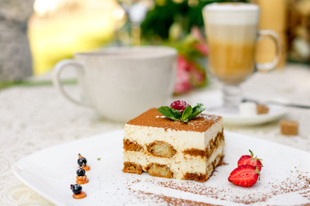cake with chocolate raspberries and strawberriesの写真素材