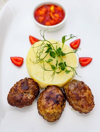mashed potatoes with cutlets for lunchの写真素材