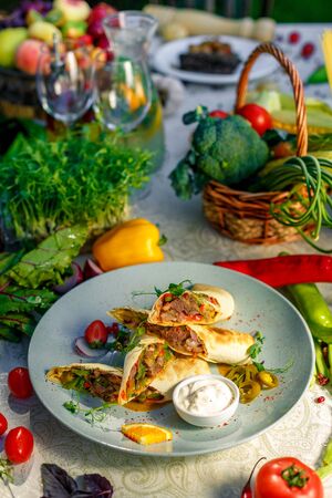 Traditional Mexican Food - Burrito, on white wooden retro tableの写真素材