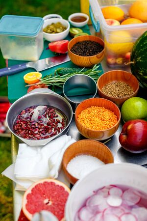 cooking, vegetables, salt and ingredients on the cooking tableの写真素材