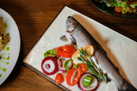 food preparation, fresh fish with vegetablesの写真素材